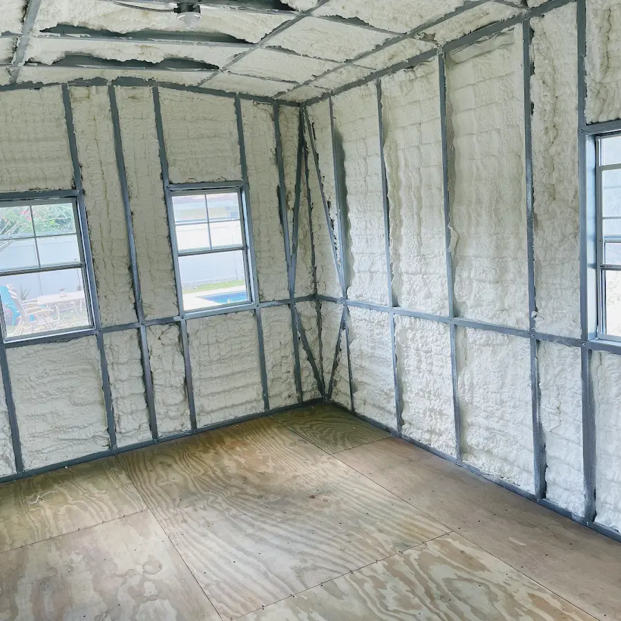 Closed-cell spray foam insulation applied to wall cavities in a residential project in Warren